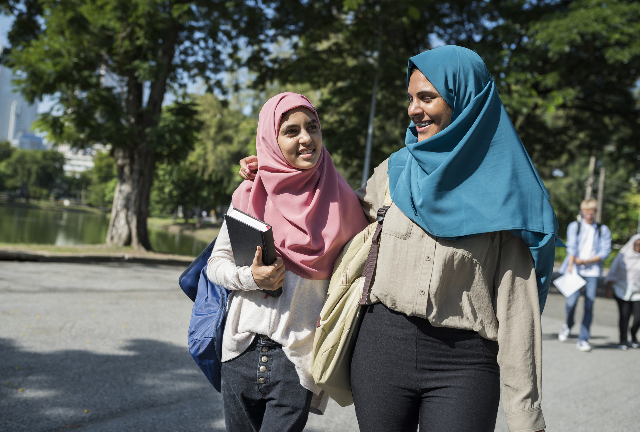 Two women walking in the street